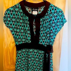 Retro looking pant suit. Super cute!